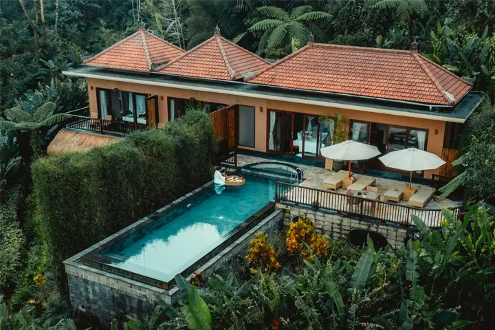 The five-bedroom pool villa with an infinity pool overlooking the rainforest