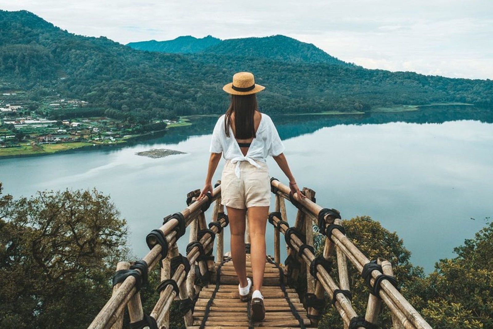 Lake Tamblingan surrounded by forested hills